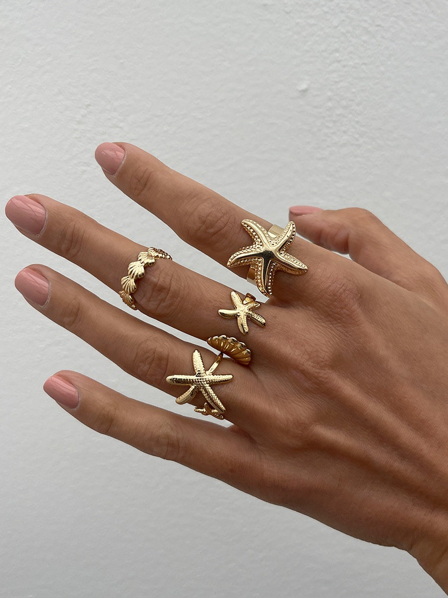 1 set of 4 summer starfish rings with adjustable opening for seaside holiday alloy rings