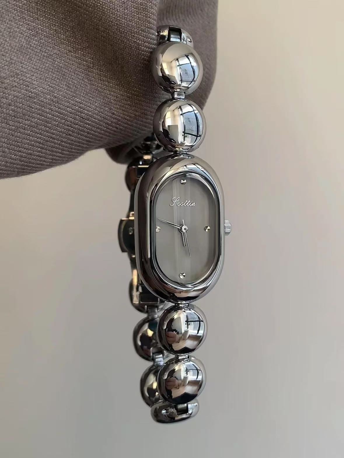 Oval niche design gray bean steel band quartz watch temperament fashion senior women's watch